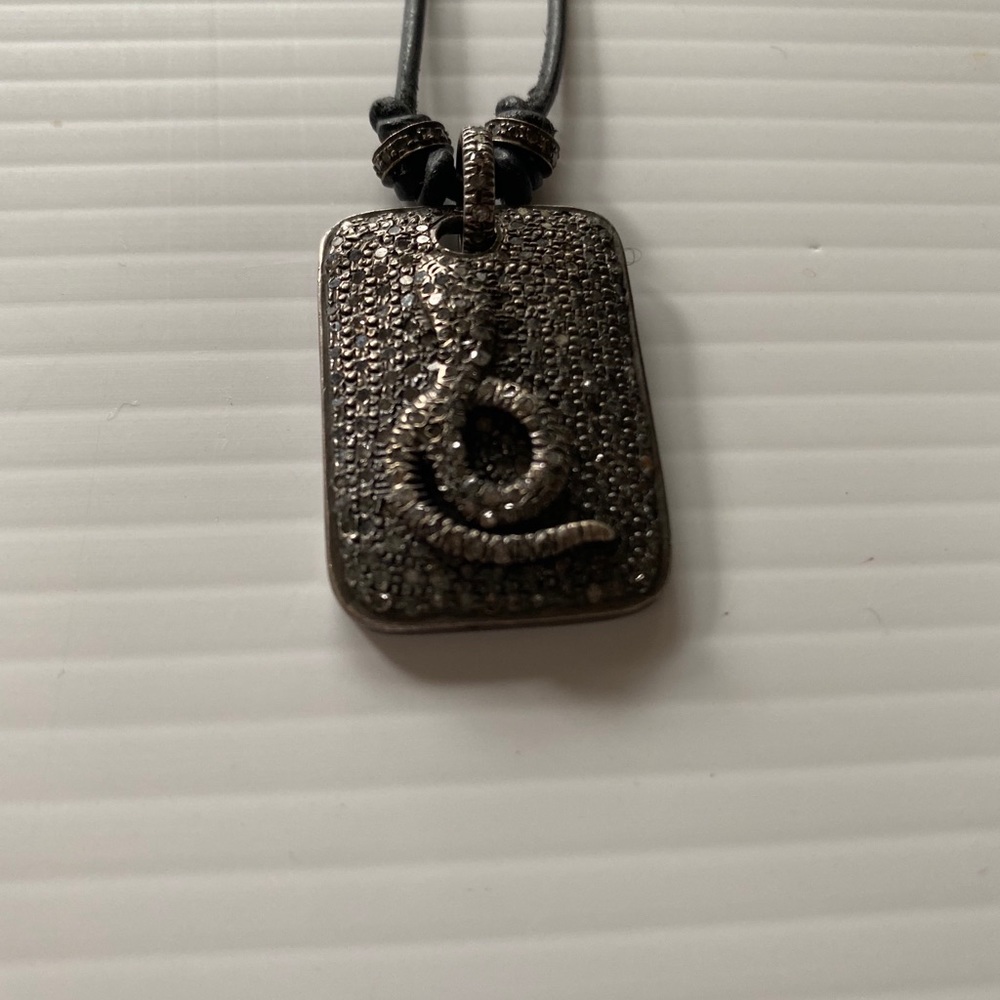 Diamond/silver snake necklace
